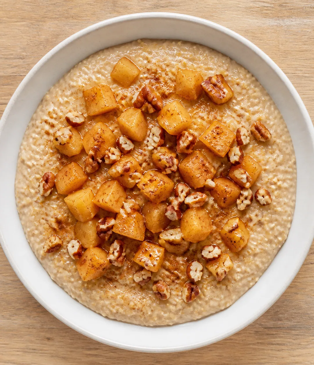 Mingau de painço com maçã, canela e noz-pecã